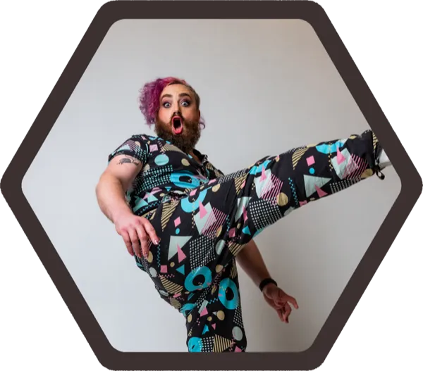 Kevin Huber kicking one leg up playfully